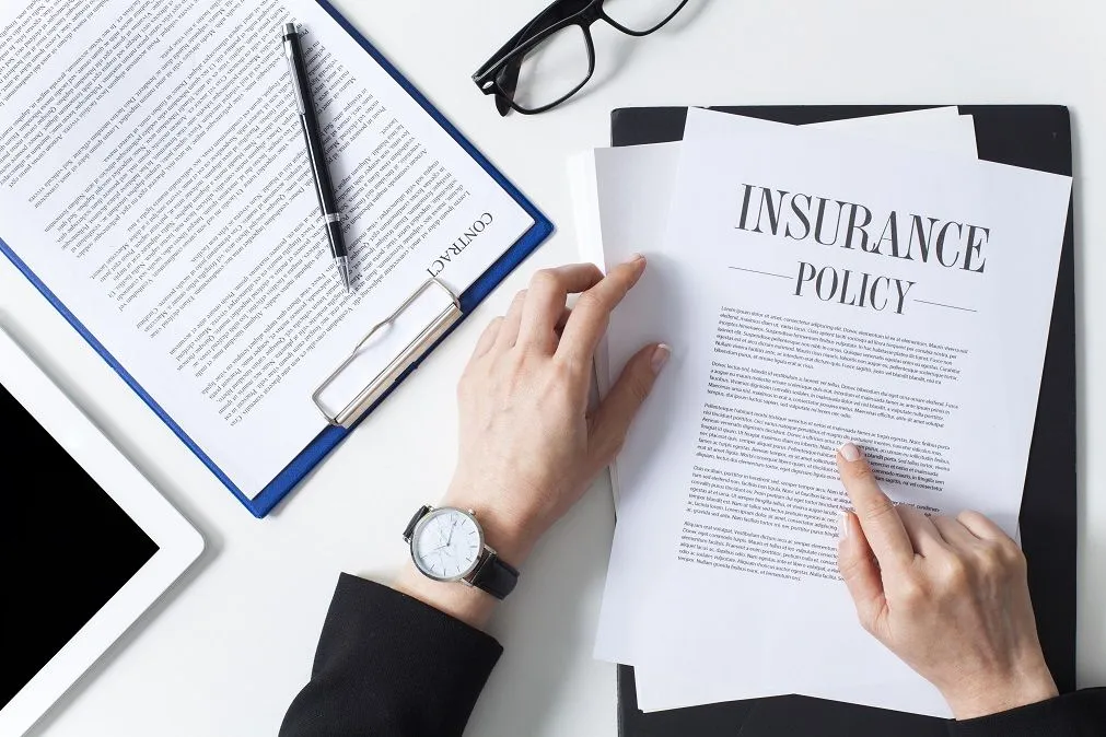 Insurance policy analysis and financial documentation